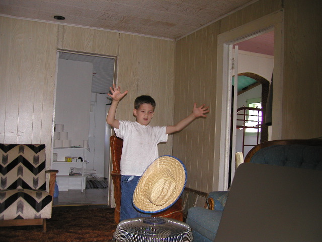8/9/02 3:11  PM - Owen's Magic Flying Hat!