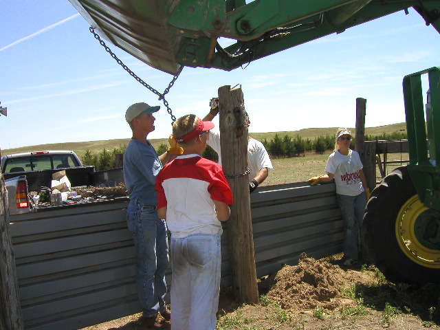 8/15/02 12:05  PM - Gotta fix this fence before we can go swimmin'