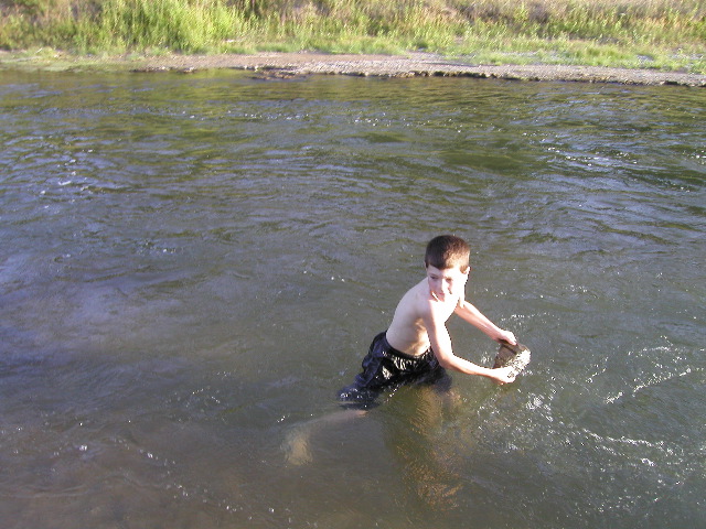 8/16/02 6:29  PM - Lucas's favorite water activity - skippin' rocks!