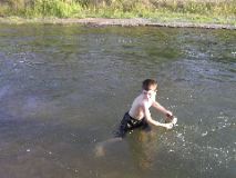 8/16/02 6:29  PM - Lucas's favorite water activity - skippin' rocks!