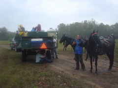 Tim enjoying a rare break from the rain...Mary is very supportive. ;)